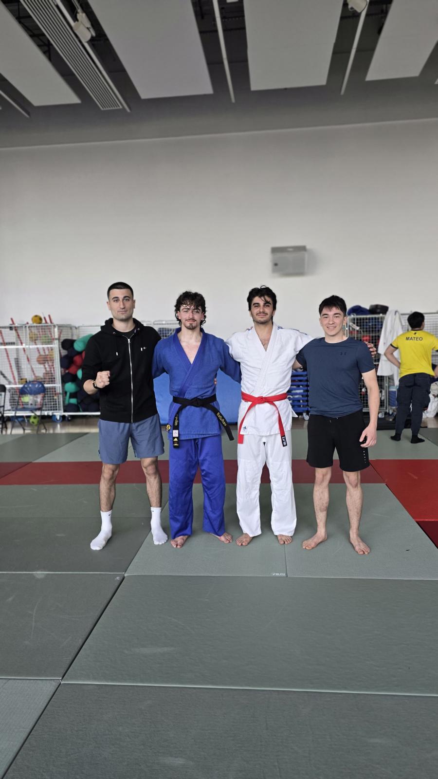 Ege Mutlu with training partners after a grappling session